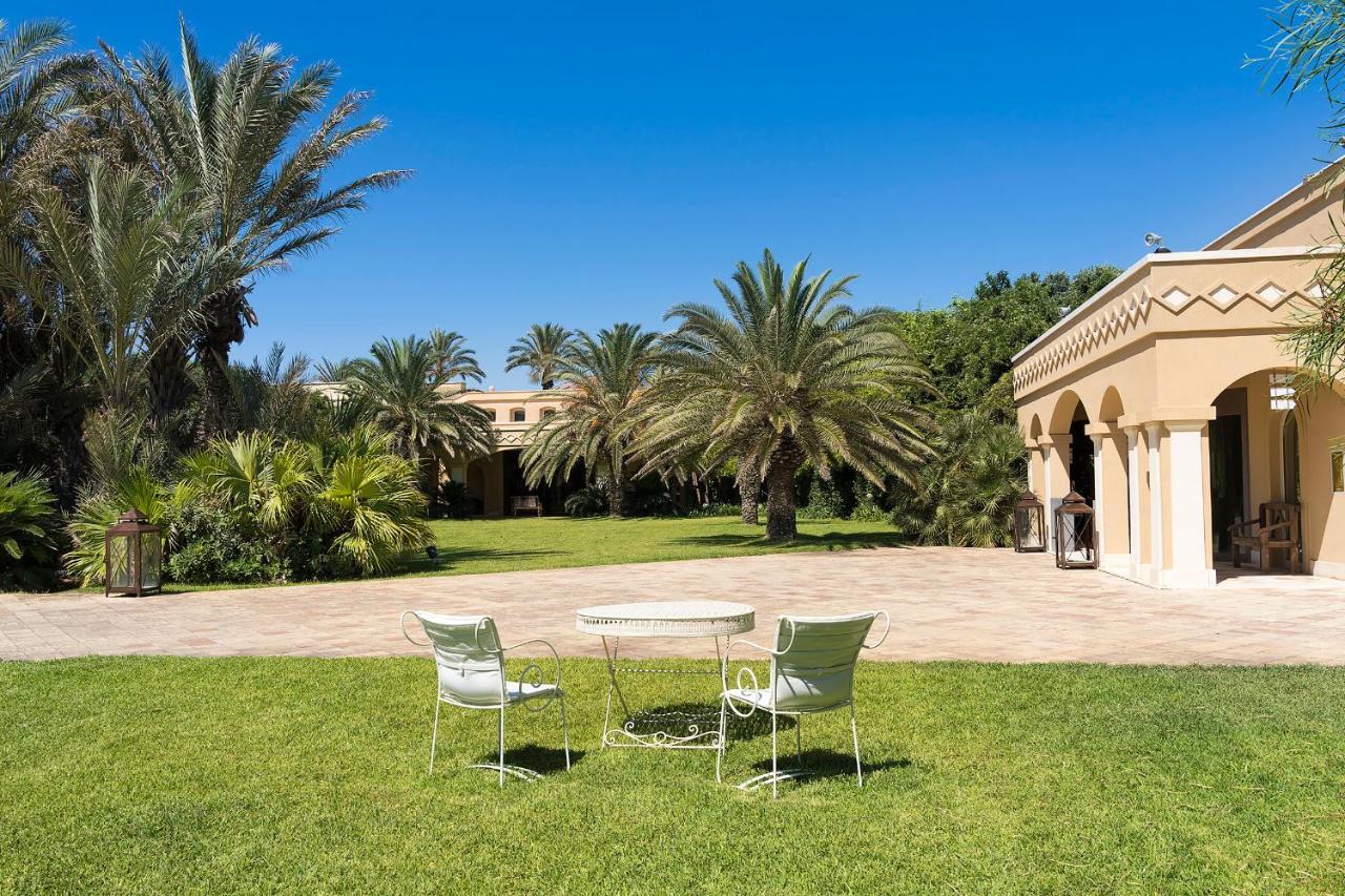 קטאניה Romano Palace Luxury Hotel מראה חיצוני תמונה The hotel's gardens