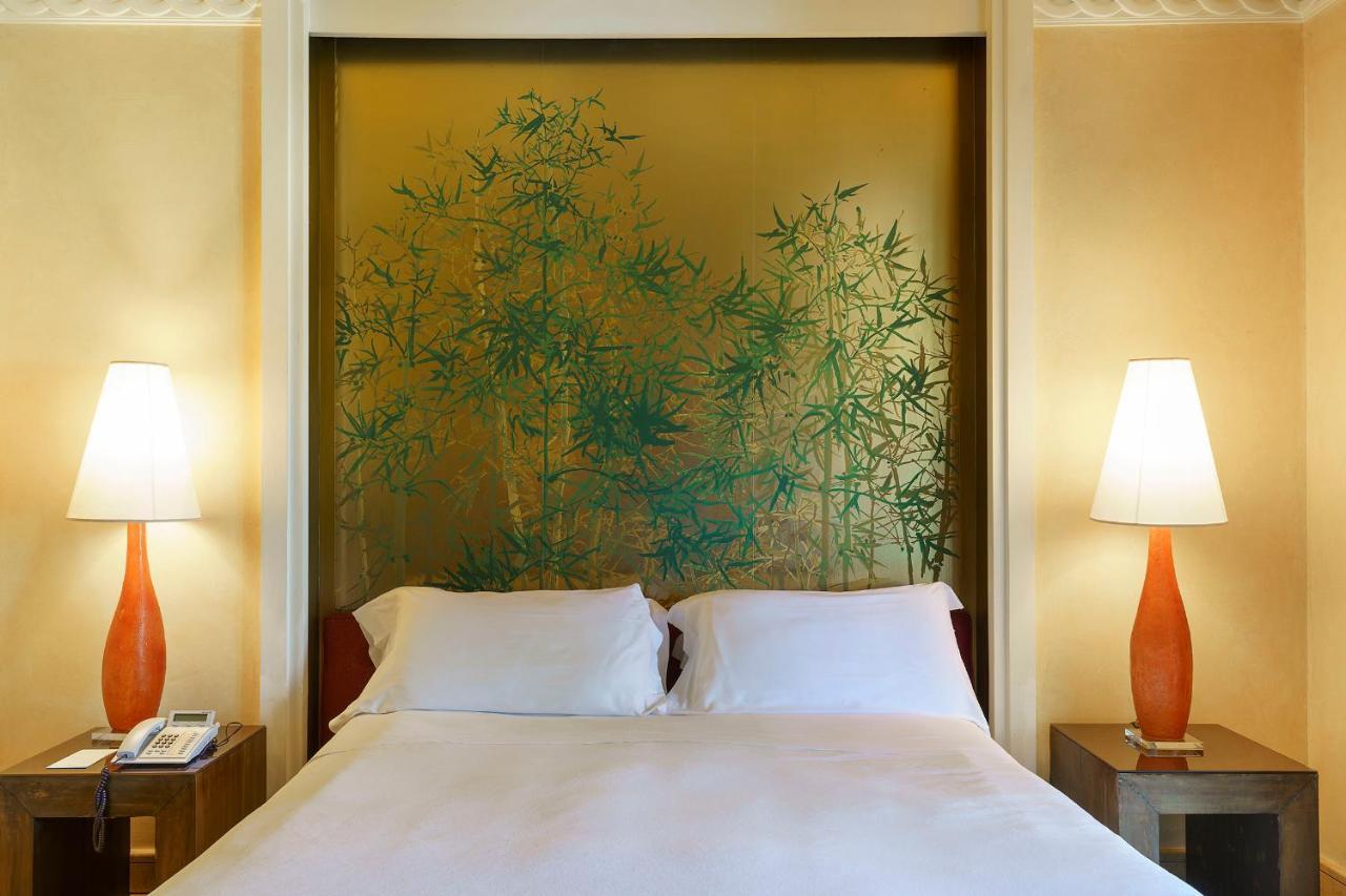 קטאניה Romano Palace Luxury Hotel מראה חיצוני תמונה A bedroom at the Mandarin Oriental, Bangkok
