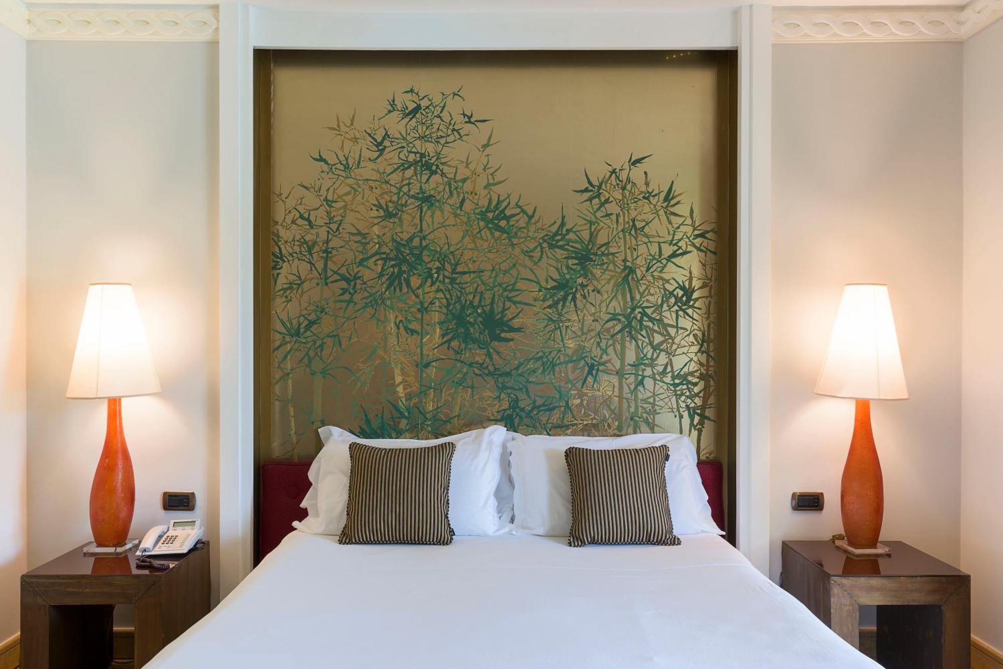 קטאניה Romano Palace Luxury Hotel מראה חיצוני תמונה A bedroom at the Mandarin Oriental, Bangkok